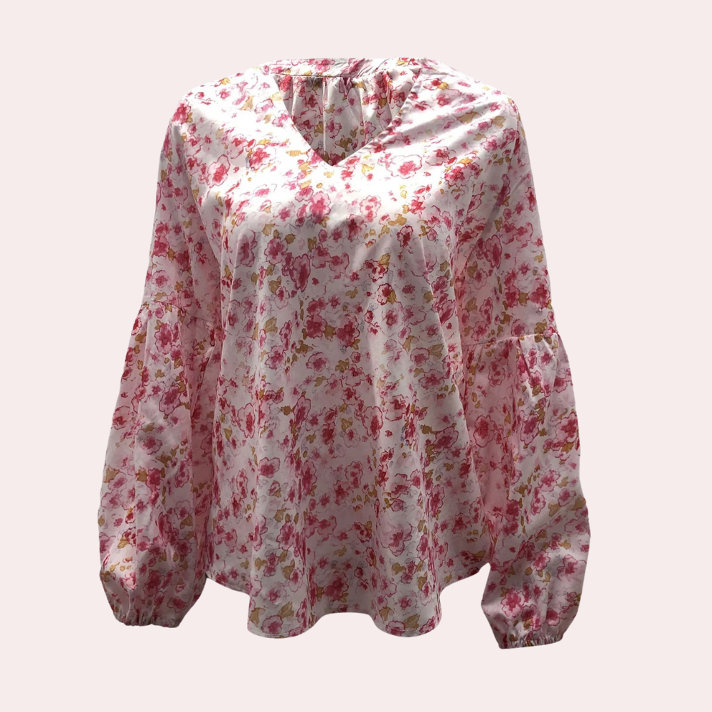 Blouse d'été imprimé floral femme, blanc élégant, tissu léger, pour un style chic et confortable par temps ensoleillé.