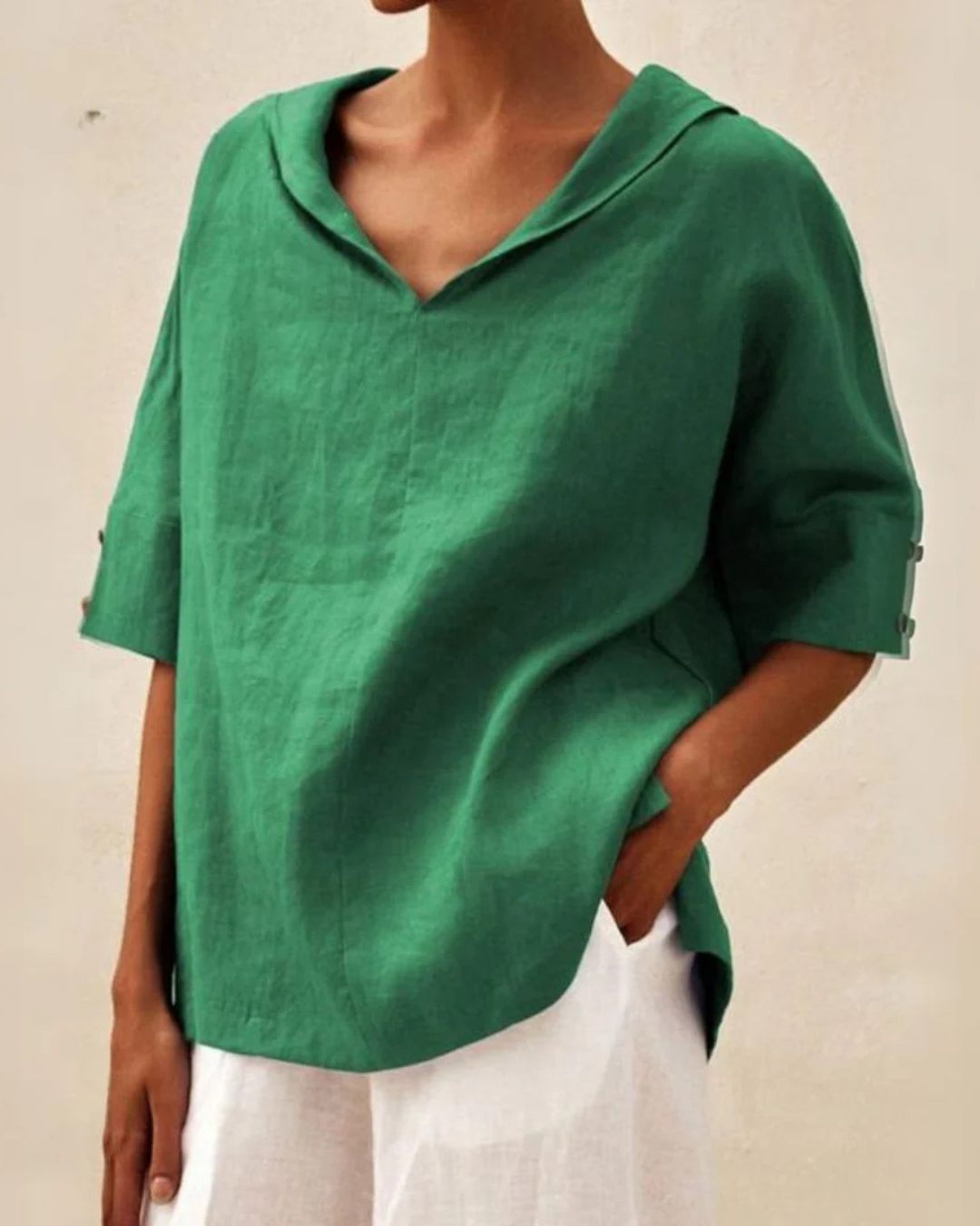 "Blouse en lin femme élégante, respirante, couleur vive, manches courtes, idéale pour l'été, style polyvalent."
