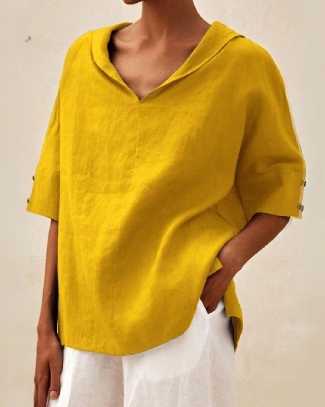 "Blouse en lin femme élégante, respirante, couleur vive, manches courtes, idéale pour l'été, style polyvalent."