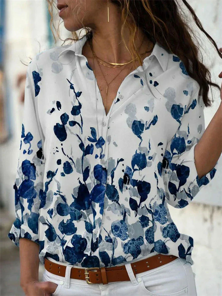 Blouse féminine élégante Séverine, coupe ludique, manches longues, tissu léger, idéal pour un look moderne et estival.