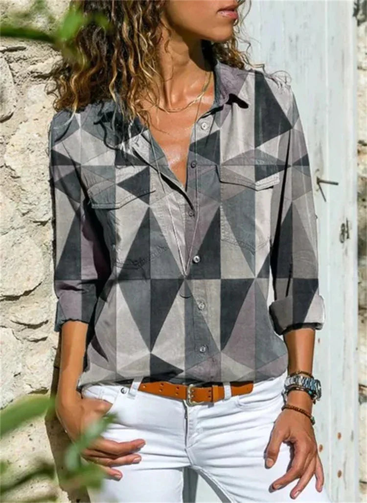 Blouse féminine élégante Séverine, coupe ludique, manches longues, tissu léger, idéal pour un look moderne et estival.