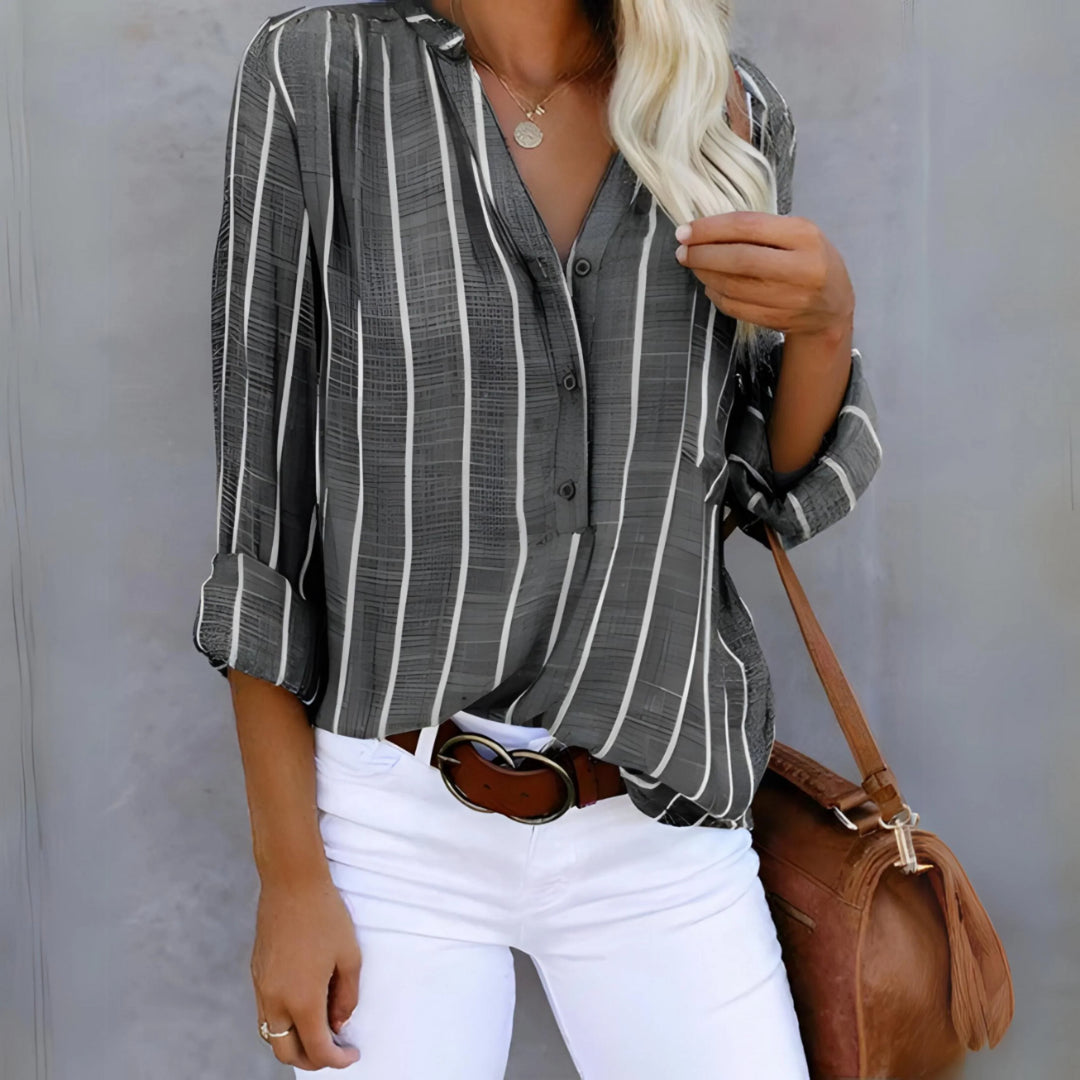 Blouse femme à rayures, manches longues, coupe fluide, élégante et confortable, parfaite pour toutes occasions.