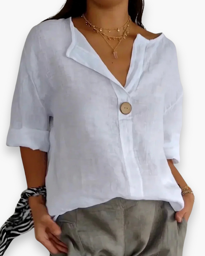 "Blouse femme ample élégante beige, coupe fluide, col en V, chic et décontractée, idéale pour un confort quotidien."