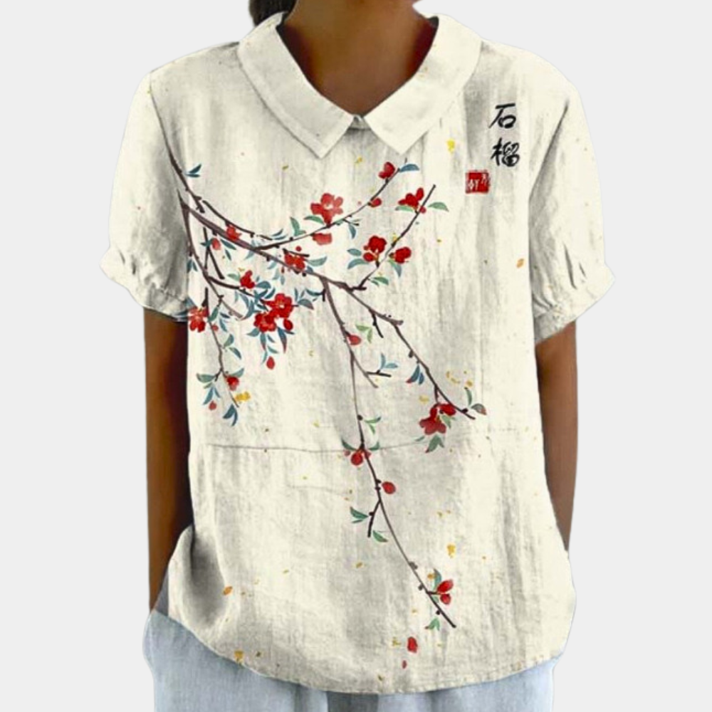 Blouse femme, imprimé fleuri pastel, col rond, couleur verte. Élégante et confortable, idéale pour un style décontracté.