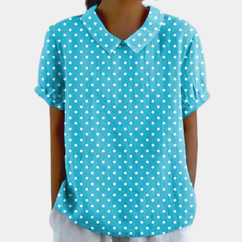 Blouse femme, imprimé fleuri pastel, col rond, couleur verte. Élégante et confortable, idéale pour un style décontracté.