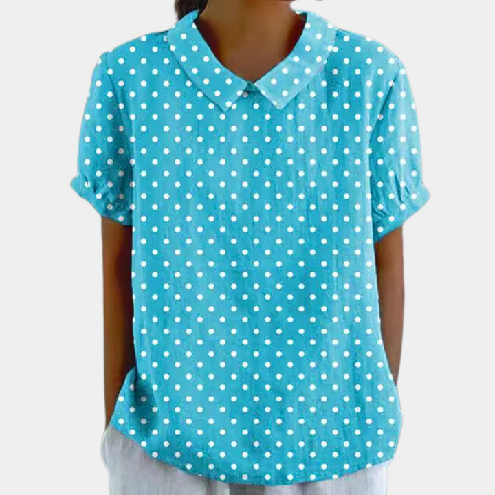 Blouse femme, imprimé fleuri pastel, col rond, couleur verte. Élégante et confortable, idéale pour un style décontracté.