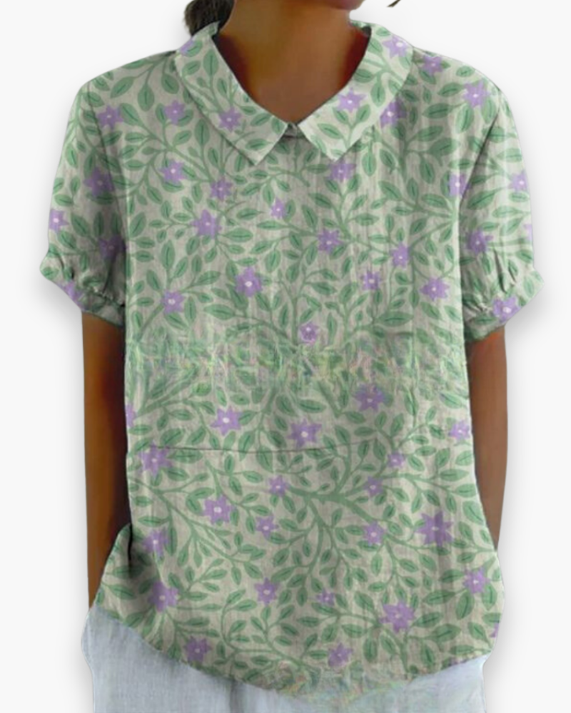 "Blouse florale décontractée femme, vue avant, coupe ample, imprimé fleuri coloré, tissu léger parfait pour l'été."