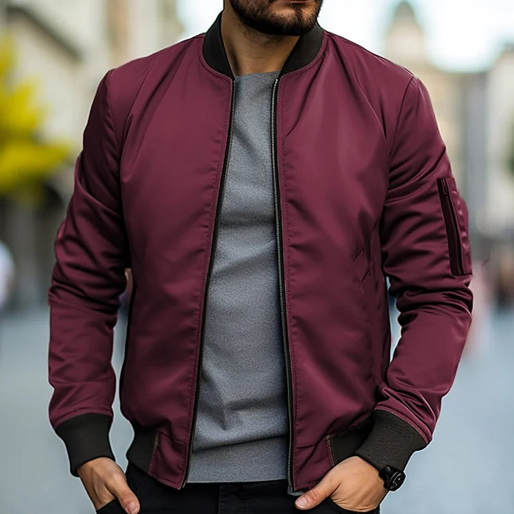 "Blouson bomber homme moderne, confortable, protection intempéries, design élégant avec bords côtelés et poches pratiques"