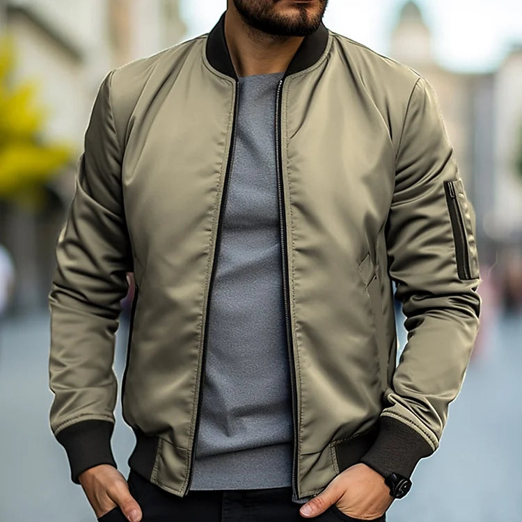 "Blouson bomber homme moderne, confortable, protection intempéries, design élégant avec bords côtelés et poches pratiques"