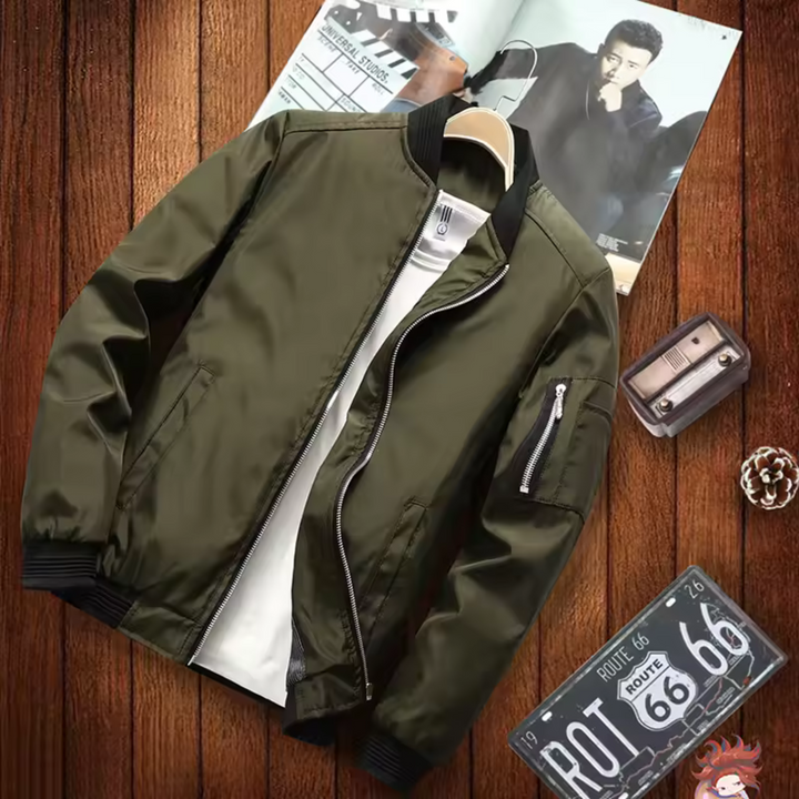 "Blouson bomber homme urbain, multi-poches, coupe-vent, en matière légère noir pour un look moderne et pratique."