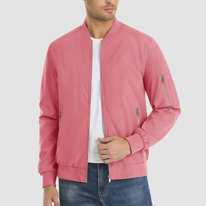 "Blouson bomber léger homme printanier, fermeture éclair, coupe moderne, tissu respirant, couleur bleu royal vibrant."