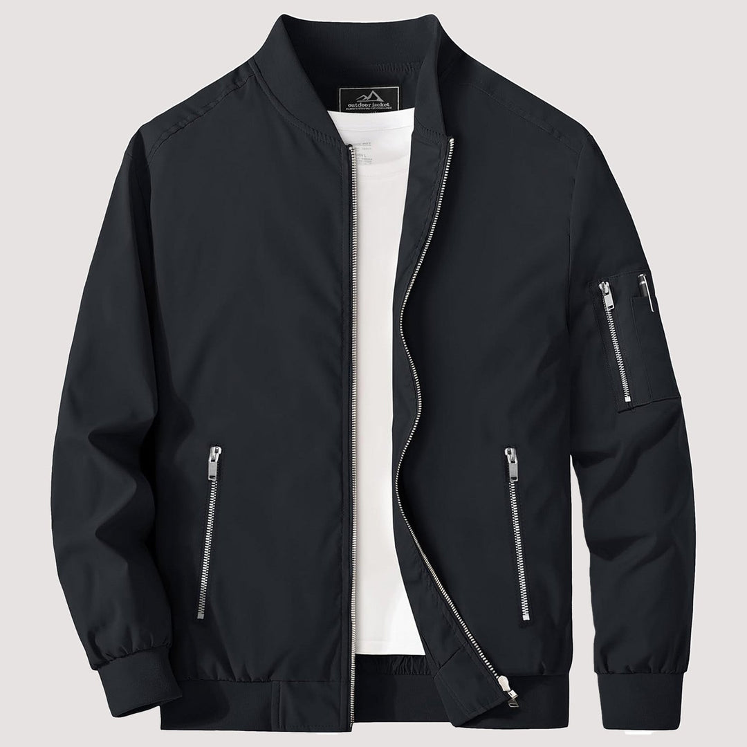 "Blouson bomber léger homme printanier, fermeture éclair, coupe moderne, tissu respirant, couleur bleu royal vibrant."