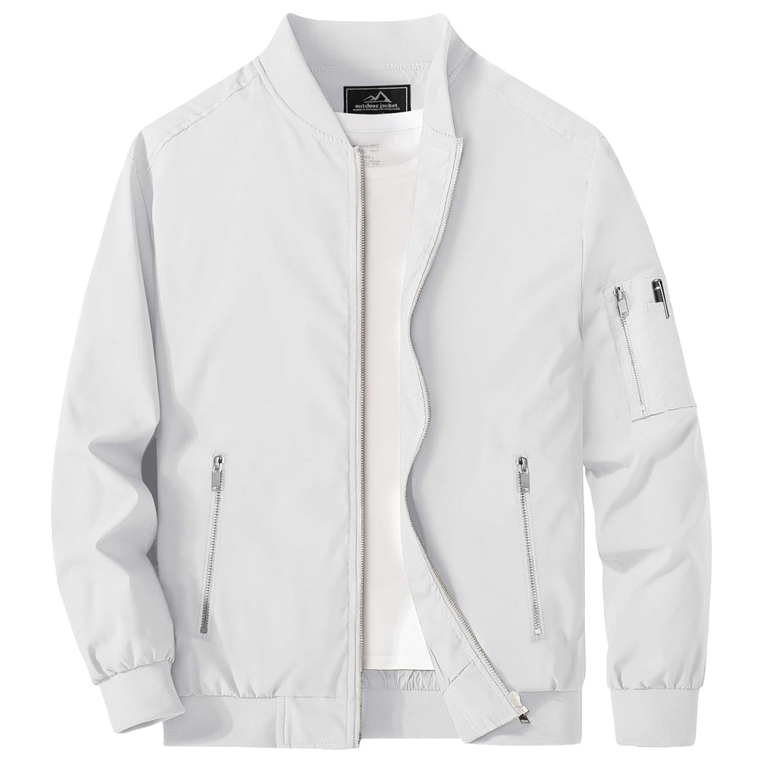 "Blouson bomber léger homme printanier, fermeture éclair, coupe moderne, tissu respirant, couleur bleu royal vibrant."