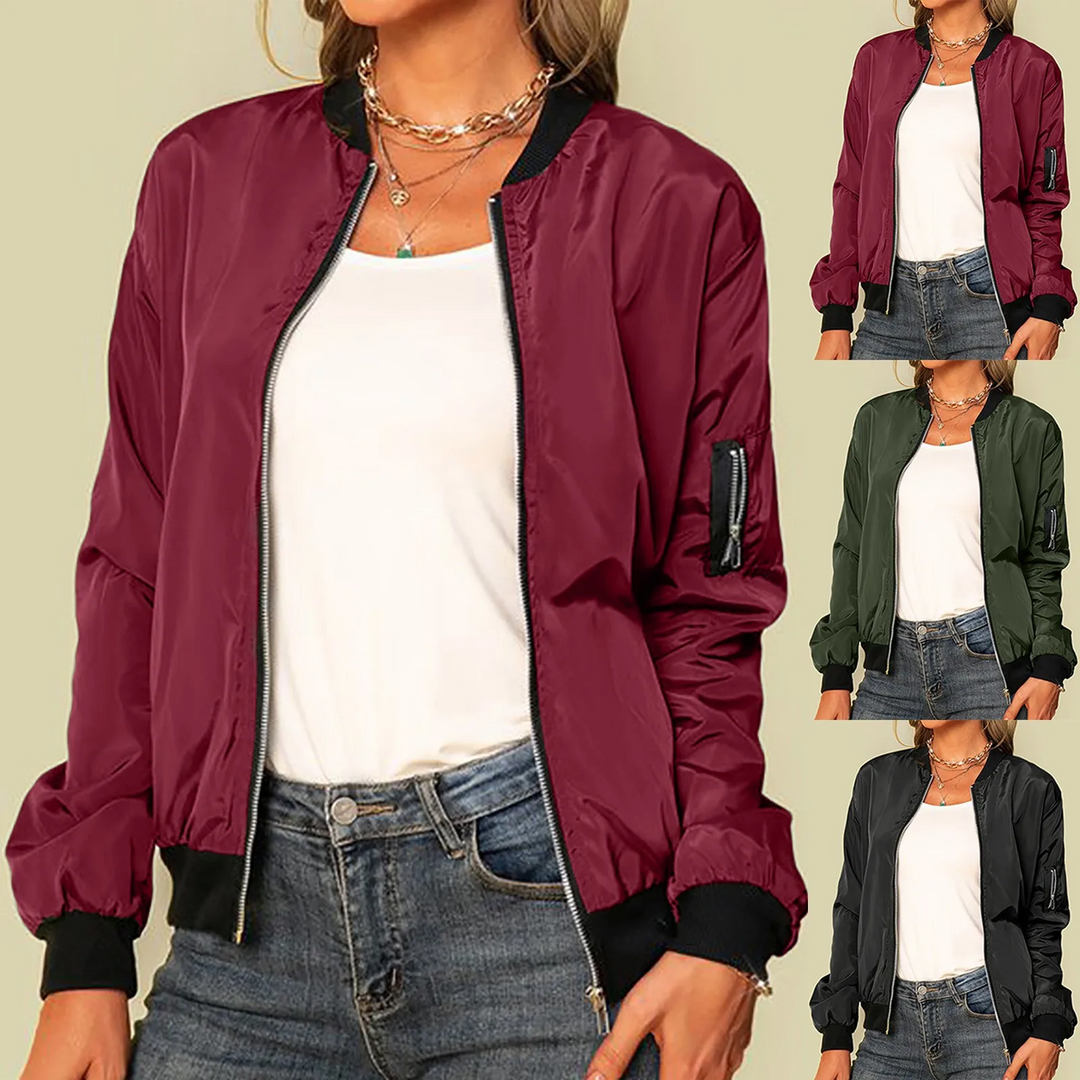 "Blouson bomber léger pour femme avec zip, tissu polyester doux, coupe moderne adaptée aux journées printanières."