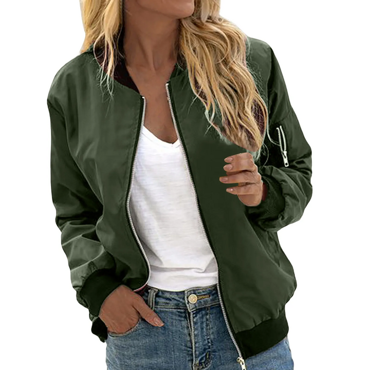 "Blouson bomber léger pour femme avec zip, tissu polyester doux, coupe moderne adaptée aux journées printanières."