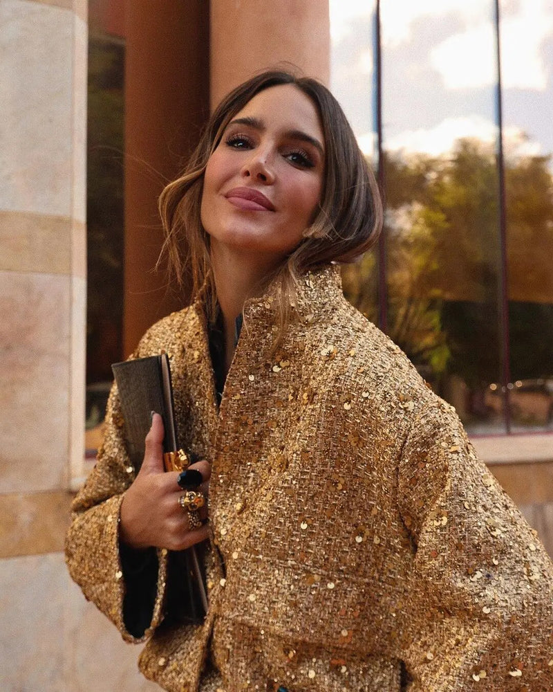 "Blouson doré à paillettes femme chic et glamour, manches longues, idéal pour soirées élégantes."