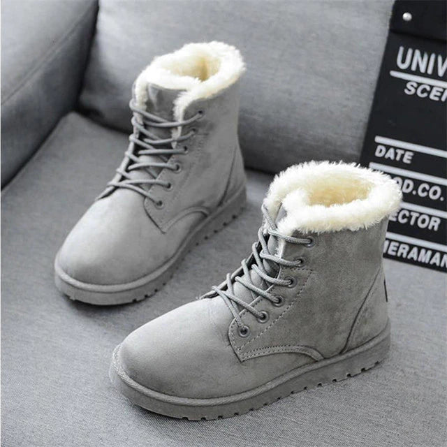 "Bottes à lacets pour hommes, montantes, robustes, avec semelle antidérapante, idéales pour l'hiver froid et enneigé."