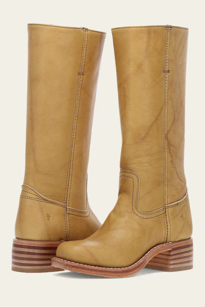 "Bottes en cuir foncé pour femmes, élégantes et confortables, style raffiné et intemporel pour toutes les occasions."