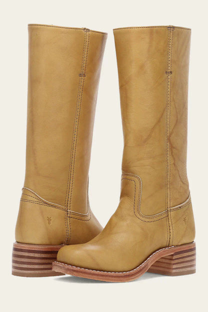 "Bottes en cuir foncé pour femmes, élégantes et confortables, style raffiné et intemporel pour toutes les occasions."