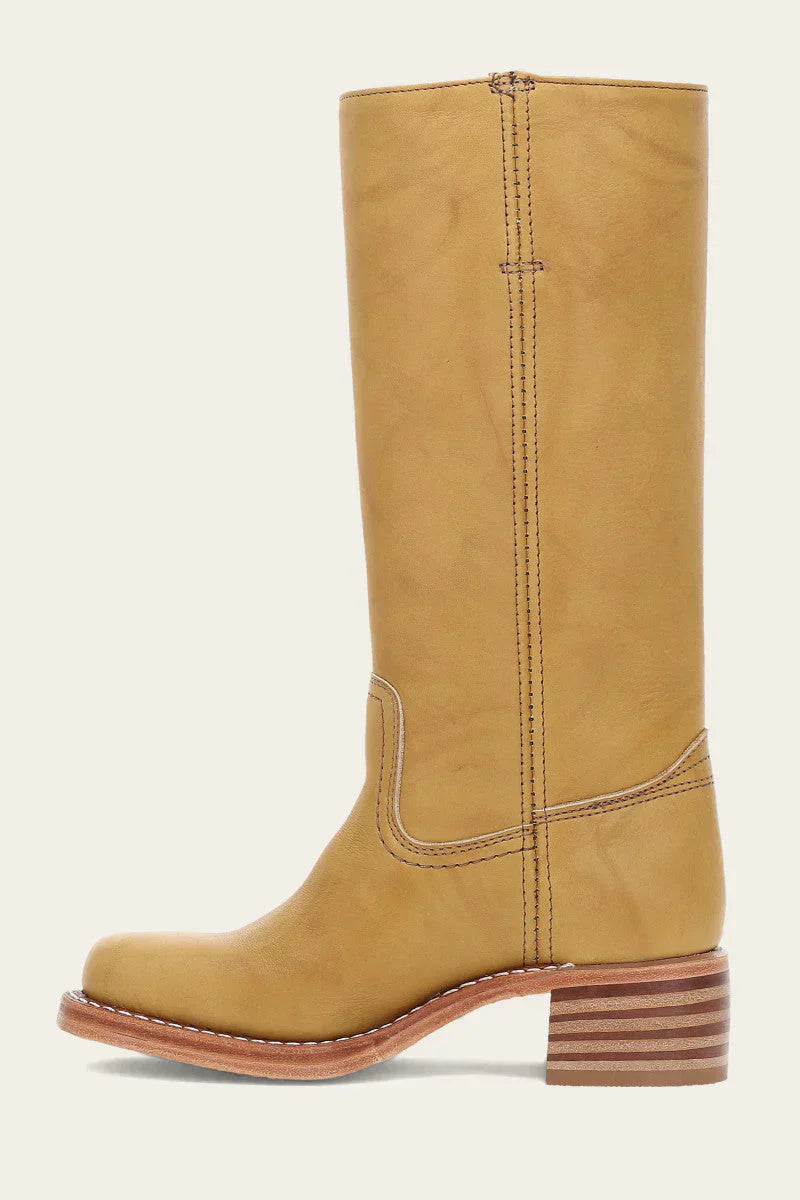 "Bottes en cuir foncé pour femmes, élégantes et confortables, style raffiné et intemporel pour toutes les occasions."