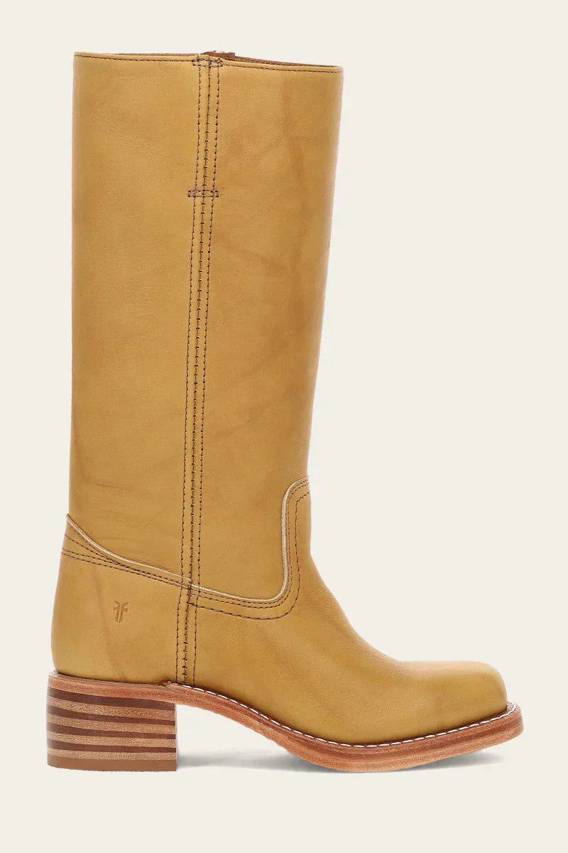"Bottes en cuir foncé pour femmes, élégantes et confortables, style raffiné et intemporel pour toutes les occasions."