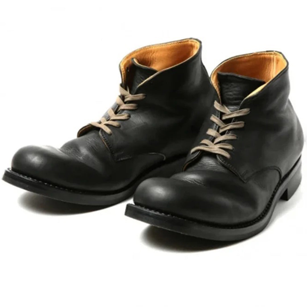"Bottes en cuir pour hommes, marron foncé, avec talon élégant, style moderne et confortable, parfaites pour toutes tenues."