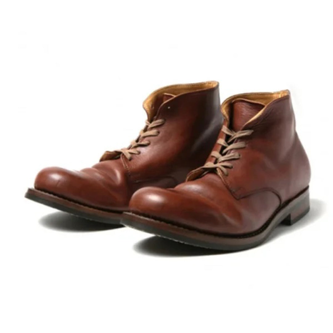 "Bottes en cuir pour hommes, marron foncé, avec talon élégant, style moderne et confortable, parfaites pour toutes tenues."