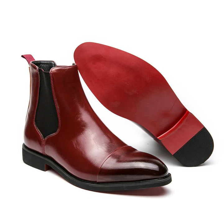 "Bottines Chelsea élégantes en cuir PU, finition polie et empiècements élastiques, look sophistiqué pour homme."