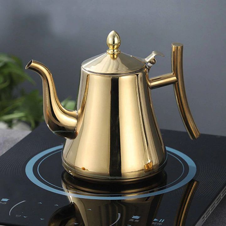 "Bouilloire induction acier inox 1L, filtre intégré, design élégant argenté, cuisine moderne, chauffe rapide, durable."