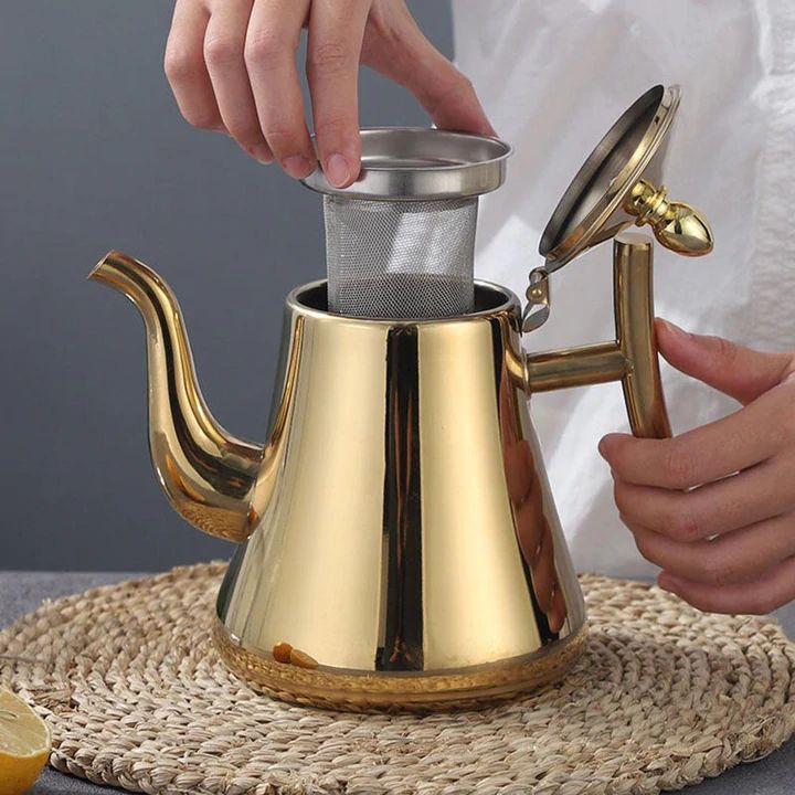 Bouilloire induction en acier inoxydable, haute capacité, filtre intégré, finition élégante idéale pour cuisine moderne.