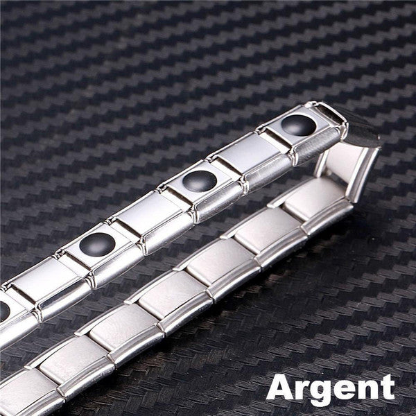 "Bracelet magnétique élégant en noir et argent, avec pierres ocre, offrant équilibre énergétique et bienfaits thérapeutiques.