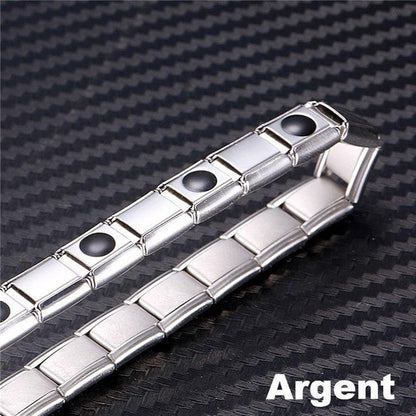"Bracelet magnétique élégant en noir et argent, avec pierres ocre, offrant équilibre énergétique et bienfaits thérapeutiques.