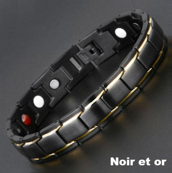 "Bracelet magnétique élégant en noir et argent, avec pierres ocre, offrant équilibre énergétique et bienfaits thérapeutiques.