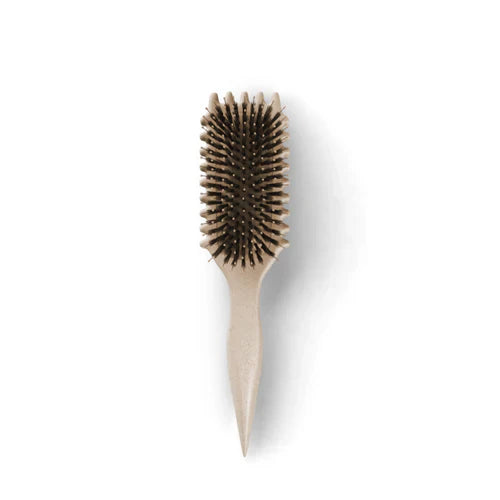 "Brosse coiffante 3-en-1 pour boucles, manche ergonomique, idéale pour dompter frisottis, en blanc laiteux ou vert clair."