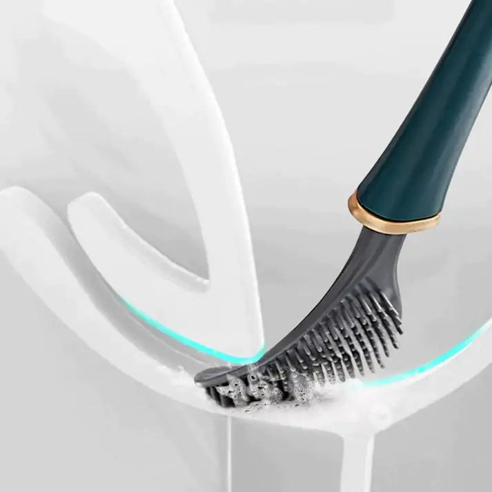 "Brosse WC en silicone moderne, couleur bleu royal, tête plate et pointes souples pour nettoyage efficace et élégant."