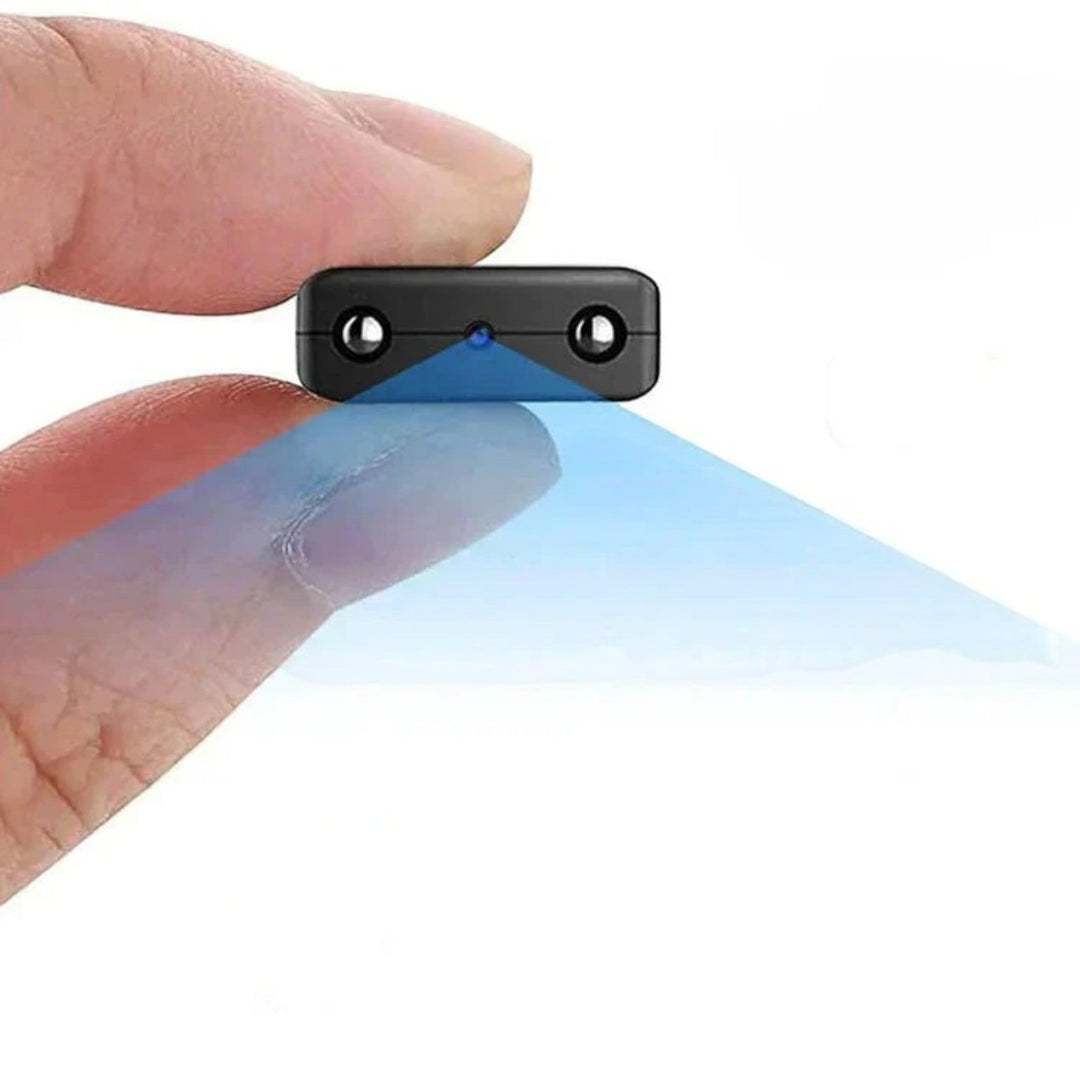 Caméra HD compacte WiFi, vision nocturne, design discret, technologie avancée, vue grand angle, surveillance maison.
