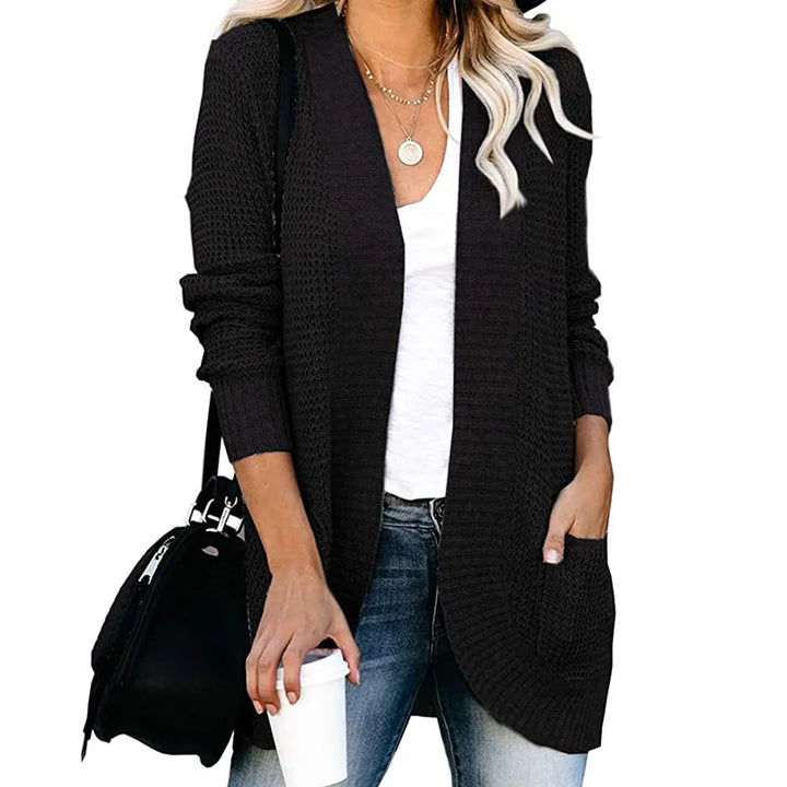 "Cardigan en laine pour femme, doux et élégant, coupe moderne, détail soigné, parfait pour toutes occasions."