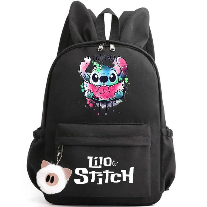 "Cartable enfant Stitch bleu avec motif amusant et porte-clés, design pratique et adorable pour école."