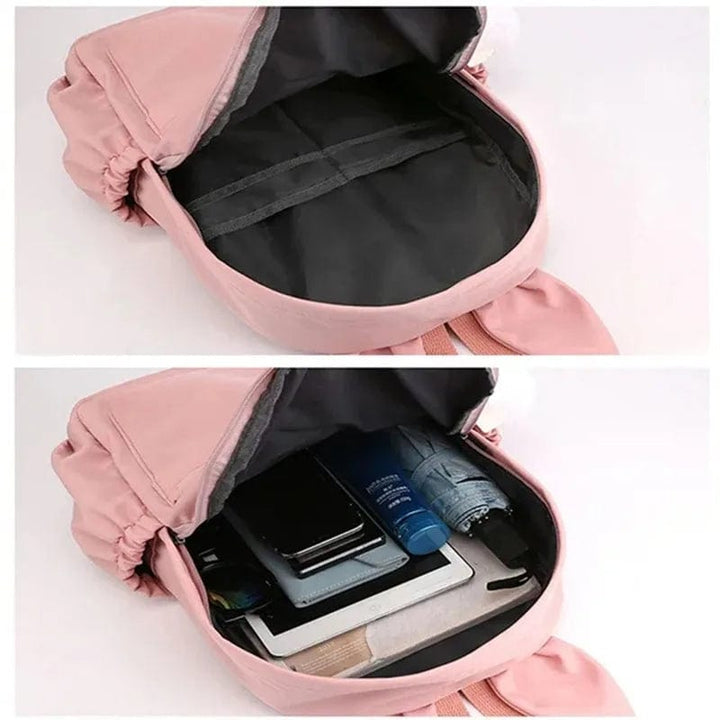 "Cartable enfant Stitch bleu avec motif amusant et porte-clés, design pratique et adorable pour école."
