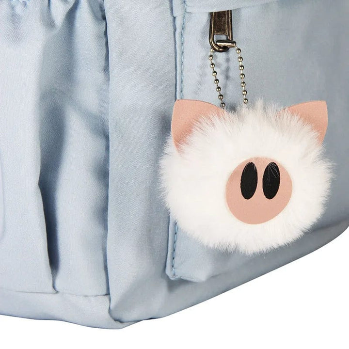 "Cartable enfant Stitch bleu avec motif amusant et porte-clés, design pratique et adorable pour école."
