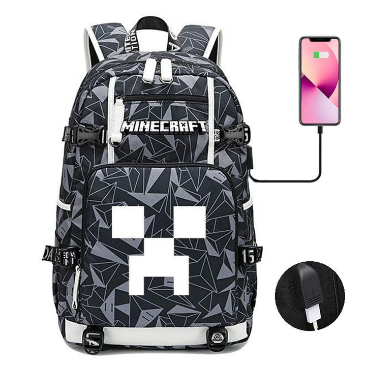 "Cartable Minecraft bleu avec design moderne, poches pratiques et sangles ajustables pour jeunes aventuriers scolaires."