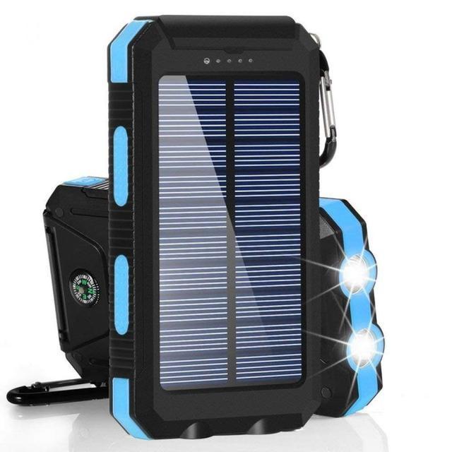 "Chargeur solaire 20000mAh étanche, antichoc, LED intégrée sur fond naturel, idéal pour activités extérieures."