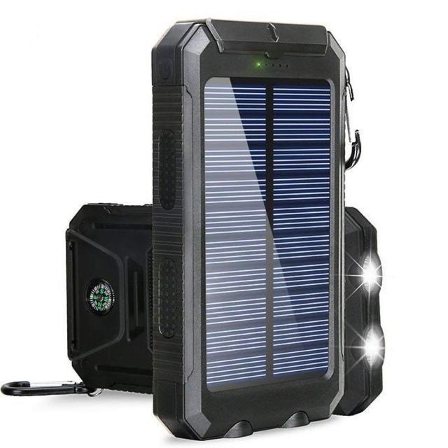 "Chargeur solaire 20000mAh étanche, antichoc, LED intégrée sur fond naturel, idéal pour activités extérieures."