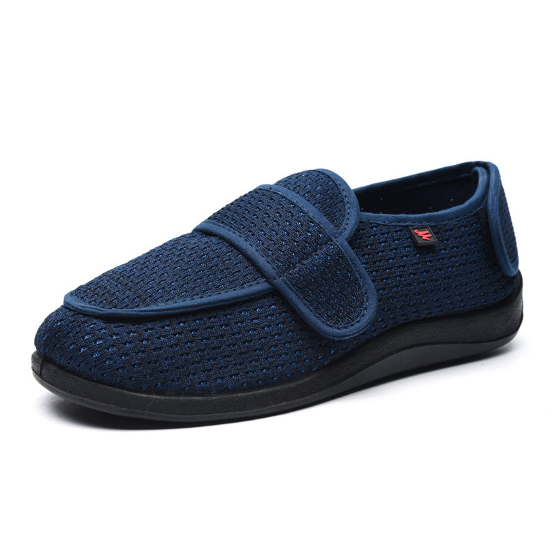 "Chaussons orthopédiques respirants gris avec semelles antidérapantes, parfaits pour pieds sensibles et confort à domicile."