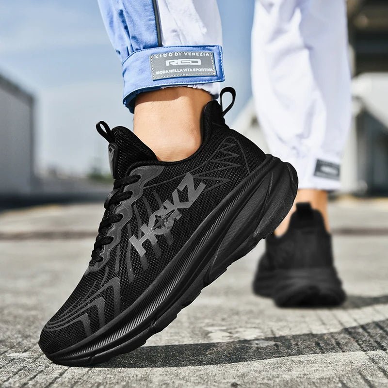 "Chaussure de sport ultra-légère blanche unisexe, semelle rembourrée, idéale pour course et fitness, design moderne."