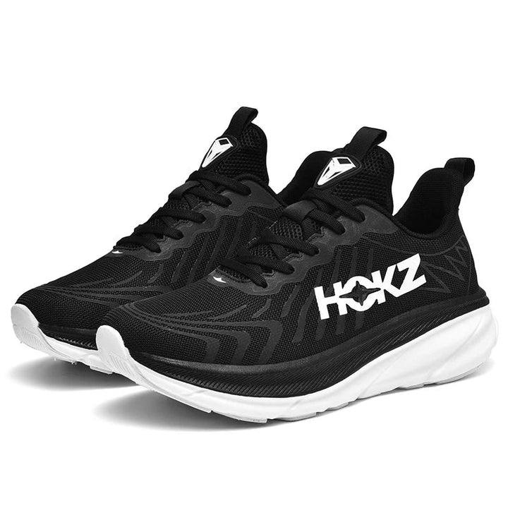 "Chaussure de sport ultra-légère blanche unisexe, semelle rembourrée, idéale pour course et fitness, design moderne."