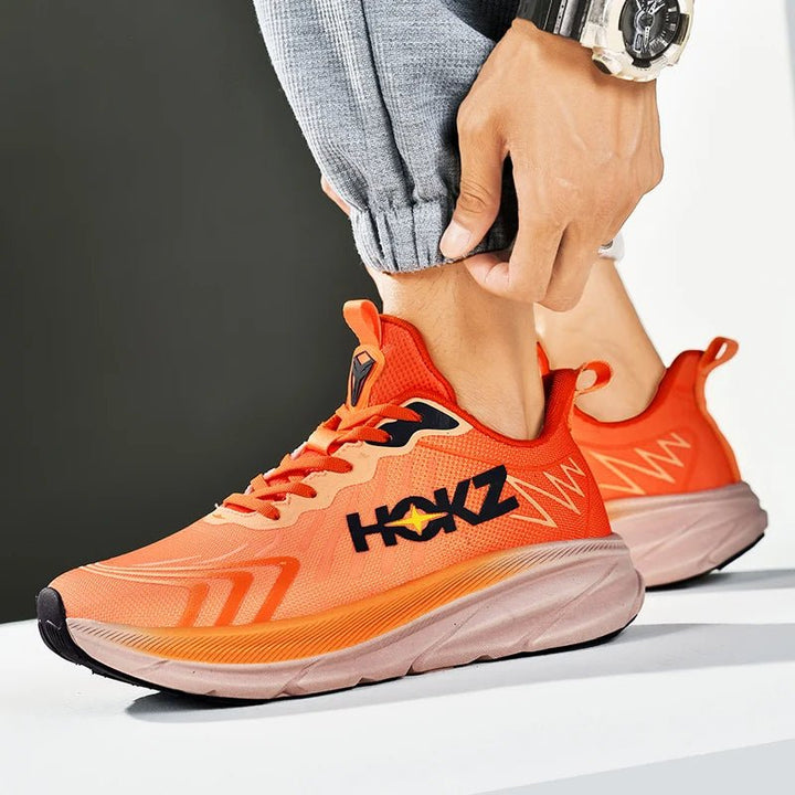 "Chaussure de sport ultra-légère blanche unisexe, semelle rembourrée, idéale pour course et fitness, design moderne."