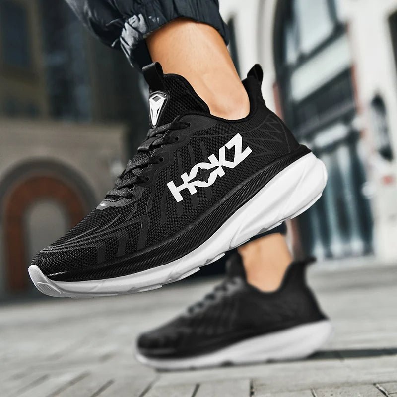 "Chaussure de sport ultra-légère blanche unisexe, semelle rembourrée, idéale pour course et fitness, design moderne."