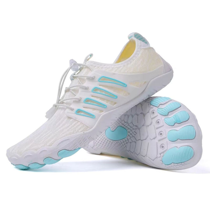 "Chaussures barefoot unisexe minimalistes grises, légères et flexibles, pour confort orthopédique et marche naturelle."