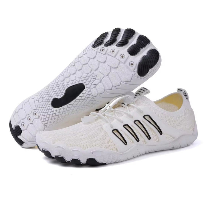 "Chaussures barefoot unisexe minimalistes grises, légères et flexibles, pour confort orthopédique et marche naturelle."